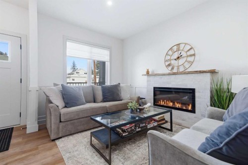 3-5324 49 Avenue, Lacombe, AB - Indoor Photo Showing Living Room With Fireplace