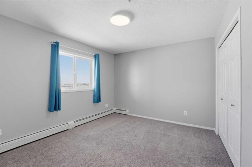 310-3 Broadway Rise, Sylvan Lake, AB - Indoor Photo Showing Other Room