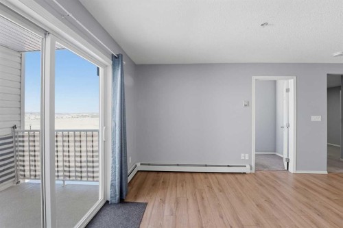 310-3 Broadway Rise, Sylvan Lake, AB - Indoor Photo Showing Other Room