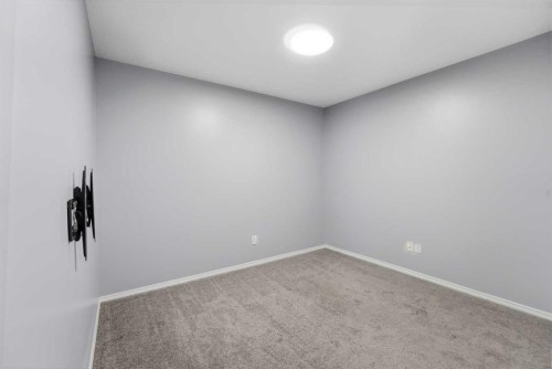 310-3 Broadway Rise, Sylvan Lake, AB - Indoor Photo Showing Other Room