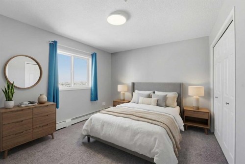 310-3 Broadway Rise, Sylvan Lake, AB - Indoor Photo Showing Bedroom