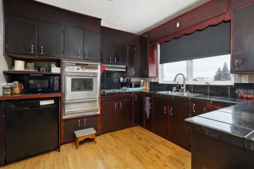5402 52 Street, Bashaw, AB - Indoor Photo Showing Kitchen With Double Sink