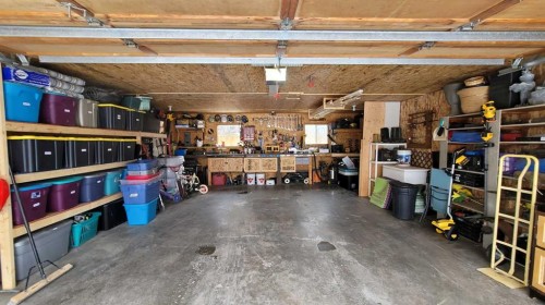 2 Westheights Drive, Didsbury, AB - Indoor Photo Showing Garage