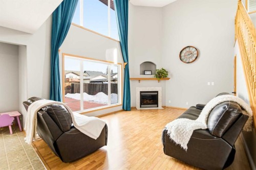 71 Kind Close, Red Deer, AB - Indoor Photo Showing Other Room With Fireplace