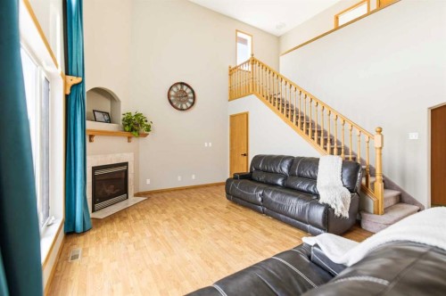 71 Kind Close, Red Deer, AB - Indoor Photo Showing Living Room With Fireplace