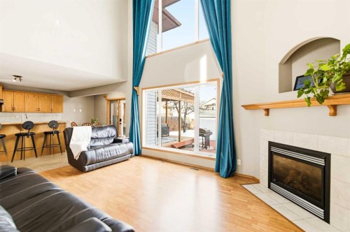 71 Kind Close, Red Deer, AB - Indoor Photo Showing Living Room With Fireplace