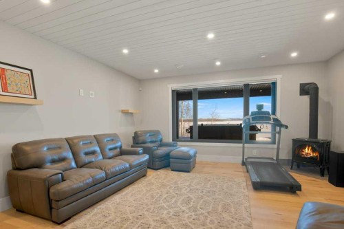 371 Last Chance Way, Norglenwold, AB - Indoor With Fireplace