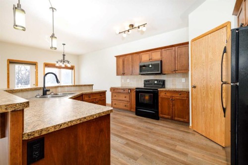 6010 Orr Drive, Red Deer, AB - Indoor Photo Showing Kitchen With Double Sink