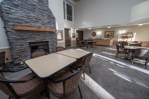 233-56 Carroll Crescent, Red Deer, AB - Indoor With Fireplace