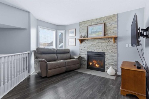 69 Willow Springs Crescent, Sylvan Lake, AB - Indoor Photo Showing Living Room With Fireplace