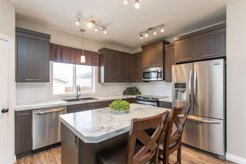 178 Truant Crescent, Red Deer, AB - Indoor Photo Showing Kitchen With Stainless Steel Kitchen With Double Sink With Upgraded Kitchen