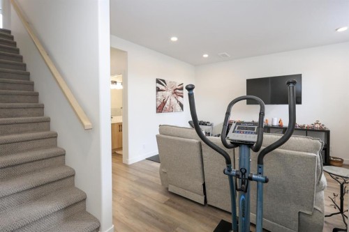 E-2 Evergreen Way, Red Deer, AB - Indoor Photo Showing Gym Room