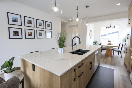 E-2 Evergreen Way, Red Deer, AB - Indoor Photo Showing Kitchen With Double Sink With Upgraded Kitchen
