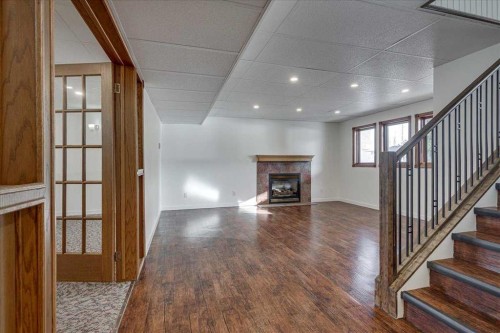 34 Richards Crescent, Red Deer, AB - Indoor Photo Showing Other Room With Fireplace