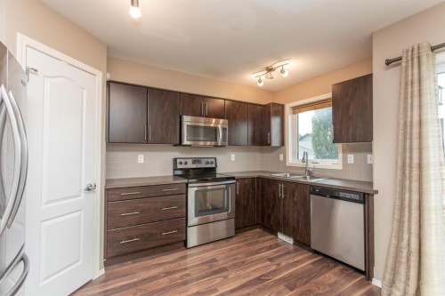 1104-30 Carleton Avenue, Red Deer, AB - Indoor Photo Showing Kitchen With Stainless Steel Kitchen With Double Sink