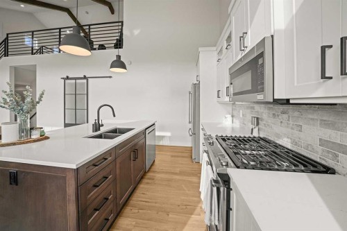 37 Arrowwood Close, Blackfalds, AB - Indoor Photo Showing Kitchen With Double Sink With Upgraded Kitchen