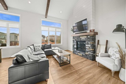 37 Arrowwood Close, Blackfalds, AB - Indoor Photo Showing Living Room With Fireplace