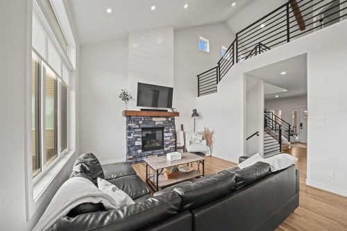 37 Arrowwood Close, Blackfalds, AB - Indoor Photo Showing Living Room With Fireplace