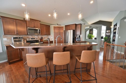 77 Pondside Crescent, Blackfalds, AB - Indoor Photo Showing Kitchen With Upgraded Kitchen