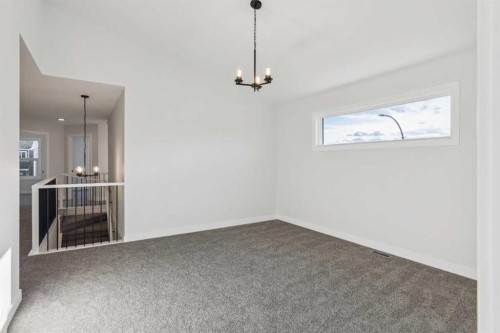 215 Sora Terrace Se, Calgary, AB - Indoor Photo Showing Other Room