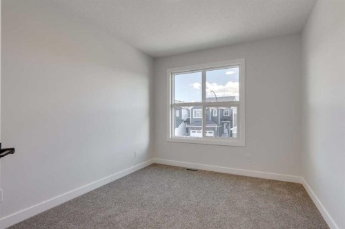 215 Sora Terrace Se, Calgary, AB - Indoor Photo Showing Other Room