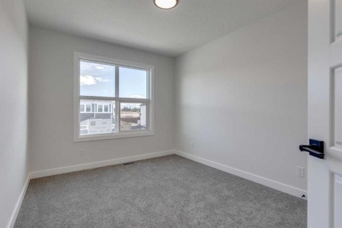 215 Sora Terrace Se, Calgary, AB - Indoor Photo Showing Other Room