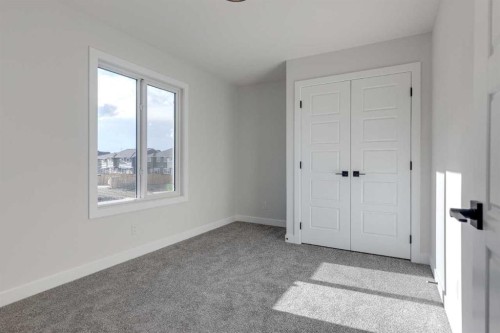 215 Sora Terrace Se, Calgary, AB - Indoor Photo Showing Other Room