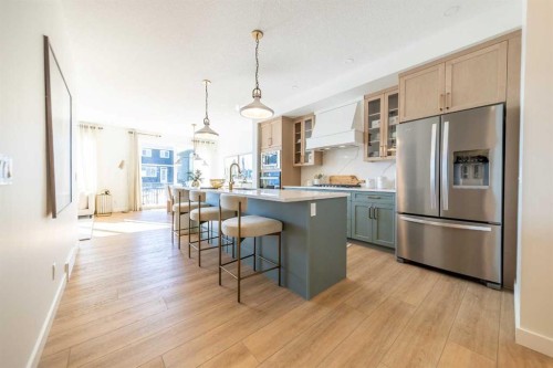 215 Sora Terrace Se, Calgary, AB - Indoor Photo Showing Kitchen With Stainless Steel Kitchen With Upgraded Kitchen