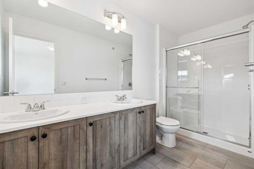 15 Emberside Park, Cochrane, AB - Indoor Photo Showing Bathroom