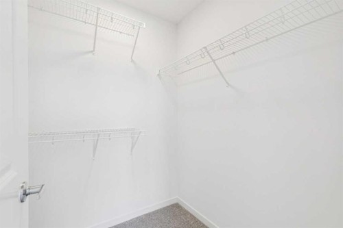 15 Emberside Park, Cochrane, AB - Indoor With Storage