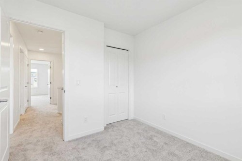 15 Emberside Park, Cochrane, AB - Indoor Photo Showing Other Room
