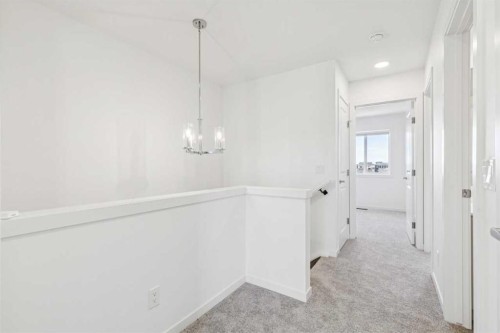 15 Emberside Park, Cochrane, AB - Indoor Photo Showing Other Room