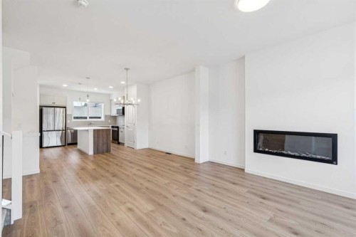15 Emberside Park, Cochrane, AB - Indoor With Fireplace