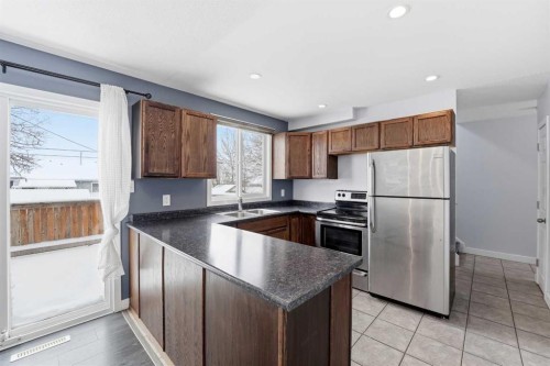 110 Terrace Park, Red Deer, AB - Indoor Photo Showing Kitchen With Stainless Steel Kitchen