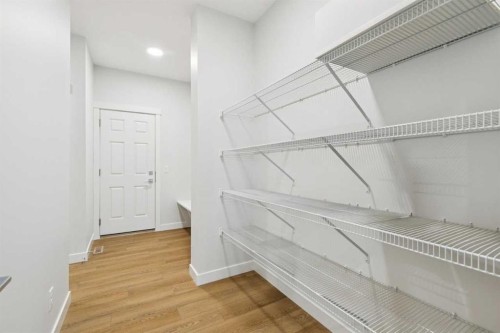 85 Southborough Square, Cochrane, AB - Indoor With Storage