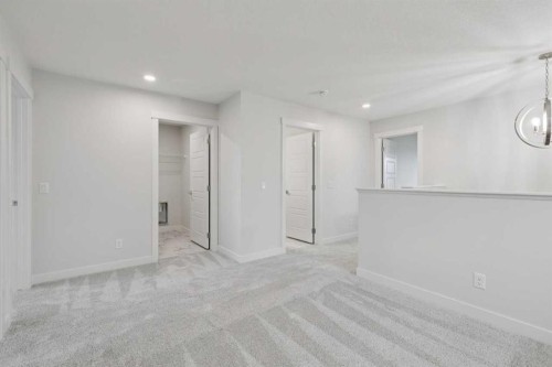 85 Southborough Square, Cochrane, AB - Indoor Photo Showing Other Room