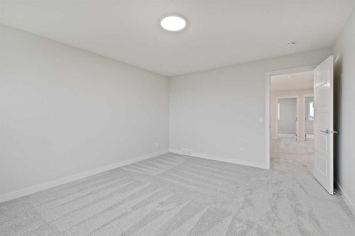 85 Southborough Square, Cochrane, AB - Indoor Photo Showing Other Room