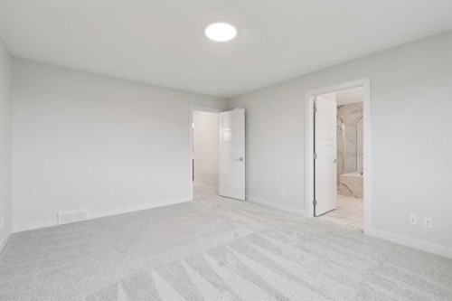 85 Southborough Square, Cochrane, AB - Indoor Photo Showing Other Room