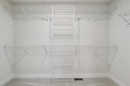 85 Southborough Square, Cochrane, AB - Indoor With Storage