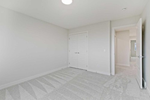 85 Southborough Square, Cochrane, AB - Indoor Photo Showing Other Room