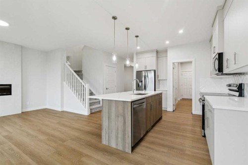 85 Southborough Square, Cochrane, AB - Indoor Photo Showing Kitchen With Upgraded Kitchen