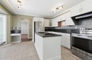 145 Wilson Crescent, Red Deer, AB  - Indoor Photo Showing Kitchen With Upgraded Kitchen 