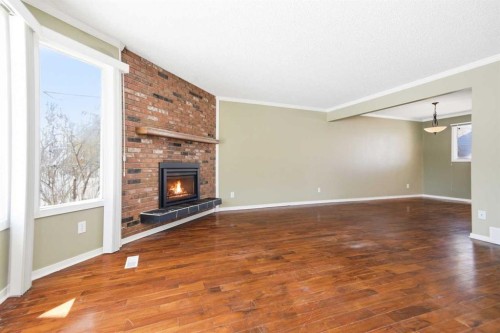 145 Wilson Crescent, Red Deer, AB - Indoor With Fireplace
