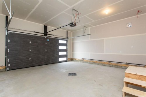 17 Tindale Place, Red Deer, AB - Indoor Photo Showing Garage