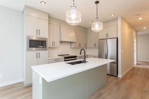 17 Tindale Place, Red Deer, AB - Indoor Photo Showing Kitchen With Stainless Steel Kitchen With Double Sink With Upgraded Kitchen