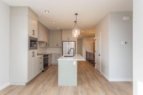 17 Tindale Place, Red Deer, AB - Indoor Photo Showing Kitchen With Stainless Steel Kitchen With Upgraded Kitchen