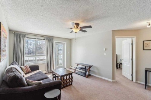 112-5340 199 Street, Edmonton, AB - Indoor Photo Showing Living Room