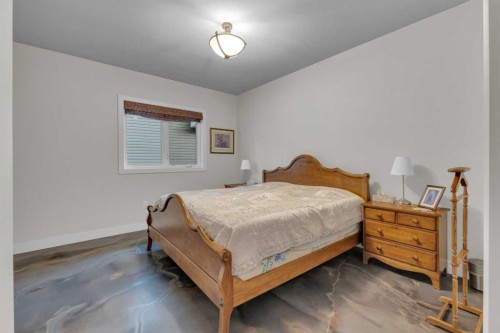 38 Grove Close, Red Deer, AB - Indoor Photo Showing Bedroom