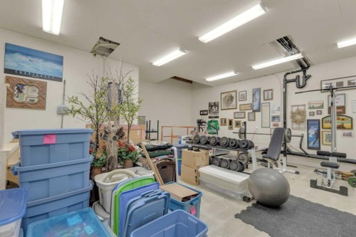 38 Grove Close, Red Deer, AB - Indoor Photo Showing Gym Room