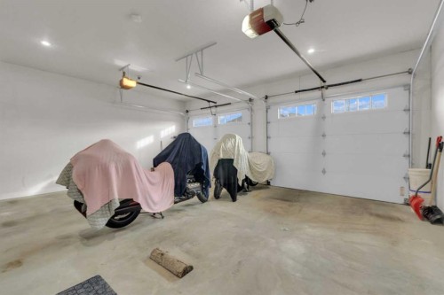 38 Grove Close, Red Deer, AB - Indoor Photo Showing Garage